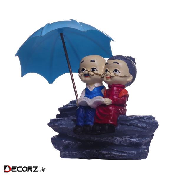 مجسمه لیلپار طرح پیر زن و مرد چتری مدل DGN-0027 مجسمه لیلپار طرح پیر زن و مرد چتری مدل DGN-0027